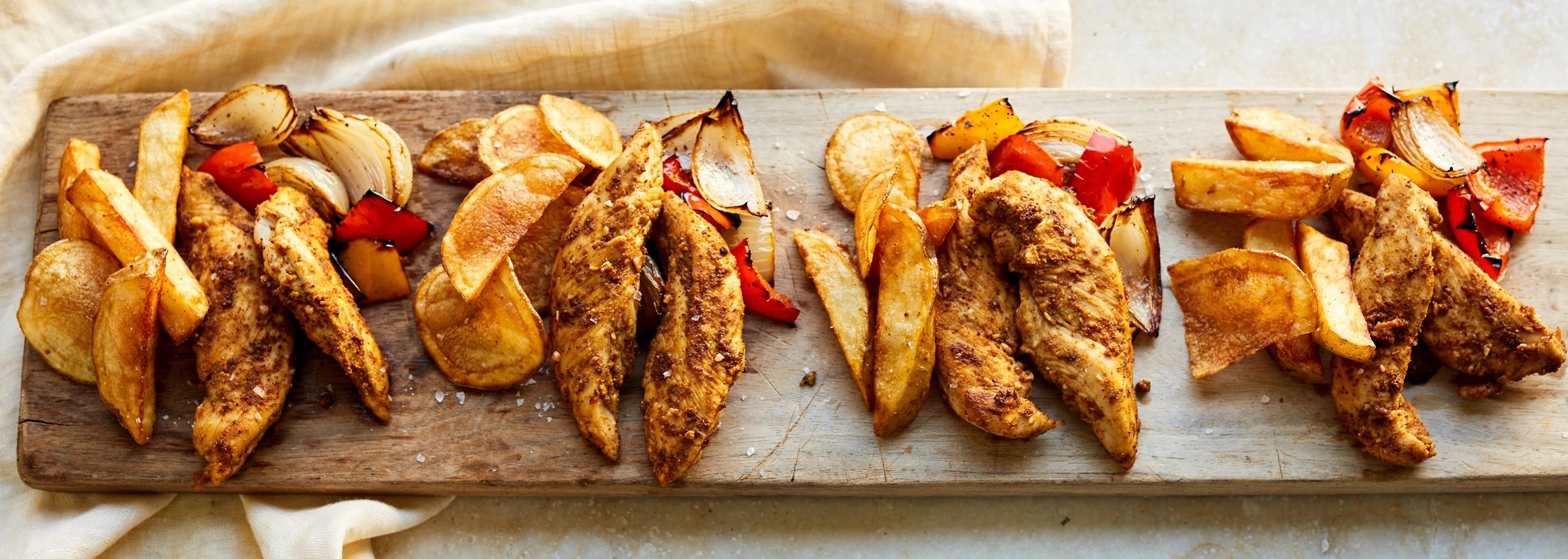 Air-fryer spice bag chicken with peppers and chips